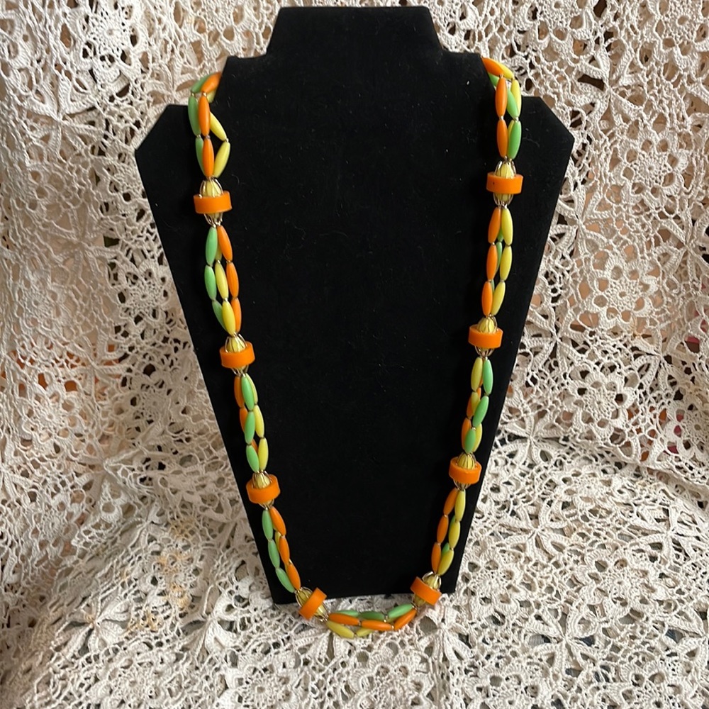 Vintage bright yellow, orange and green patterned beaded necklace